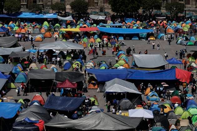 March 19, 2025, Mexico City, Cdmx, Mexico: Thousands of teachers from the National Coordinator of Education Workers (CNTE) are holding a 72-hour sit-in, setting up tents and banners in Constitution Square, in front of the National Palace in Mexico City, despite President Claudia Sheinbaum s decision to withdraw the initiative to reform the Law of the Institute of Security and Social Services for State Workers Mexico City Mexico - ZUMAp204 20250319_zip_p204_038 Copyright: xJosuexPerezx