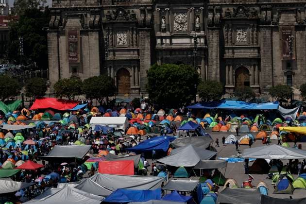 March 19, 2025, Mexico City, Cdmx, Mexico: Thousands of teachers from the National Coordinator of Education Workers (CNTE) are holding a 72-hour sit-in, setting up tents and banners in Constitution Square, in front of the National Palace in Mexico City, despite President Claudia Sheinbaum s decision to withdraw the initiative to reform the Law of the Institute of Security and Social Services for State Workers Mexico City Mexico - ZUMAp204 20250319_zip_p204_039 Copyright: xJosuexPerezx