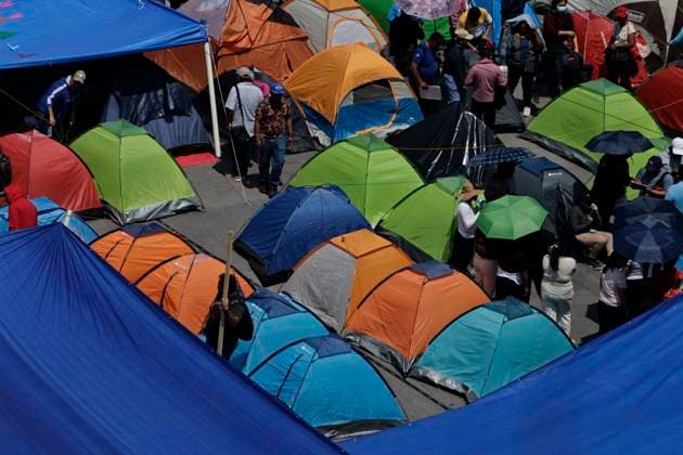 March 19, 2025, Mexico City, Cdmx, Mexico: Thousands of teachers from the National Coordinator of Education Workers (CNTE) are holding a 72-hour sit-in, setting up tents and banners in Constitution Square, in front of the National Palace in Mexico City, despite President Claudia Sheinbaum s decision to withdraw the initiative to reform the Law of the Institute of Security and Social Services for State Workers Mexico City Mexico - ZUMAp204 20250319_zip_p204_030 Copyright: xJosuexPerezx