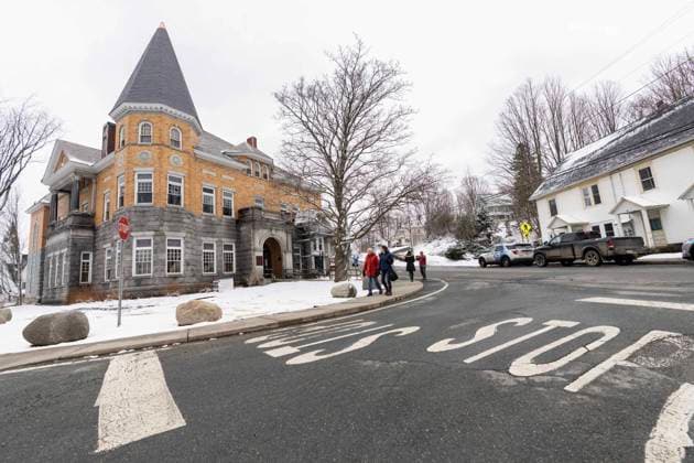 March 21, 2025, Derby Line, Vt, USA: People walk past the Haskell Free Library and Opera House in Derby Line, Vt., on Friday, March 21, 2025. The town of Stanstead, Que., says U.S. authorities have unilaterally decided to close the main Canadian access to the Victorian-style library that straddles the border between the two countries. Derby Line USA - ZUMAc35_ 20250321_zaf_c35_016 Copyright: xChristinnexMuschix