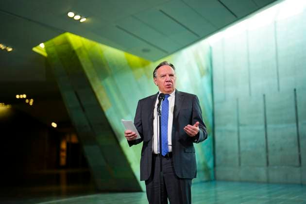 March 21, 2025, Ottawa, Ontario, Canada: Premier of Quebec Francois Legault talks with reporters as he arrives to take part in the First Ministers meeting at the National War Museum in Ottawa on Friday, March 21, 2025. Ottawa Canada  - ZUMAc35_ 20250321_zaf_c35_033 Copyright: xSeanxKilpatrickx
