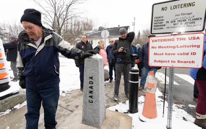 March 21, 2025, Stanstead, Qc, CAN: An American man crosses into Canada to attend a press conference about the Haskell Free Library and Opera House in Stanstead, Que., on Friday, March 21, 2025. The town of Stanstead says U.S. authorities have unilaterally decided to close the main Canadian access to the Victorian-style library that straddles the border between the two countries. Stanstead CAN  - ZUMAc35_ 20250321_zaf_c35_041 Copyright: xChristinnexMuschix