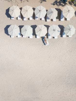 Creative Highlights Symbolfotos Woman lying on sun lounger at the beach, Gili Air, Gili Islands, Indonesia model released, Symbolfoto, KNTF03586