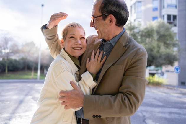 Creative Highlights Symbolfotos Happy couple embracing outdoors in an urban setting model released, Symbolfoto, JCCMF12923