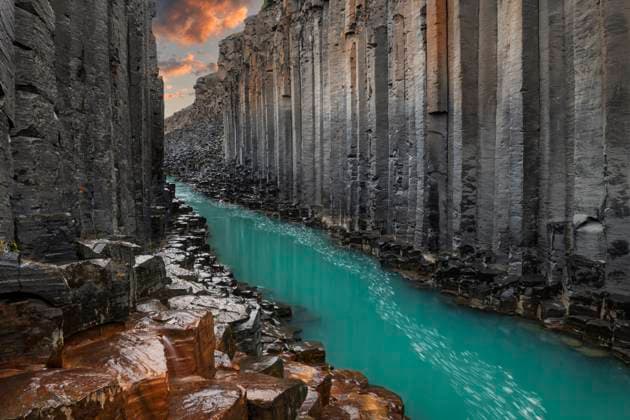 Creative Highlights World Scenic view of Studlagil Canyon with turquoise Jökla River in Iceland, RUEF04639