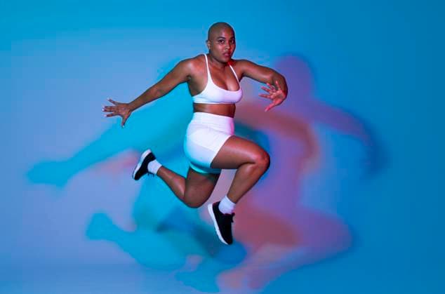 Creative Highlights Symbolfotos Bald athlete in sportswear jumping energetically in a studio model released, Symbolfoto, OIPF04696