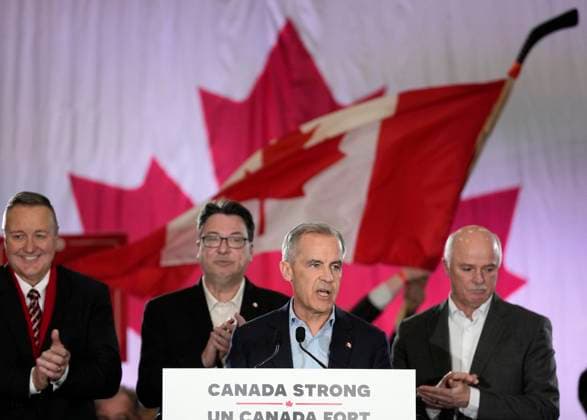 March 23, 2025, St. John s, Nl, CANADA: A supporter waves a Canadian flag on a hockey stick as Liberal Party of Canada Leader Mark Carney speaks during his campaign kick-off rally in St. John s, Sunday, March 23, 2025. St. John s CANADA  - ZUMAc35_ 20250323_zaf_c35_074 Copyright: xFrankxGunnx