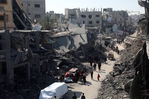 Bilder des Jahres 2025, News 03 März News Themen der Woche KW13 News Bilder des Tages (250324) -- GAZA CITY, March 24, 2025 -- This photo taken on March 24, 2025 shows rubble of buildings damaged by an Israeli shelling in the Shuja iyya neighborhood, east of Gaza City. The Palestinian death toll from ongoing Israeli attacks on the Gaza Strip has topped 50,000, Gaza-based health authorities said in a statement on March 23. (Photo by Xinhua) MIDEAST-GAZA CITY-ISRAELI ATTACKS-AFTERMATH RizekxAbdeljawad 