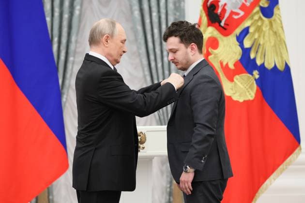 RUSSIA, MOSCOW - MARCH 25, 2025: Russia s President Vladimir Putin (L) and Russian Presidential Prize winner, head of the Moscow Architectural Institute, Alexei Kapustin, are seen during a ceremony in the Kremlin to present Russian Presidential Prizes in Culture, Literature and Art for Year 2024 to young professionals for their works aimed at children and youth. Sergei Savostyanov TASS  79356390