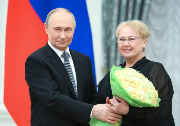 Russia Putin Culture Presidential Prize 8887509 25.03.2025 Russian President Vladimir Putin awards Principal Ballet Master of the Loktev Song and Dance Ensemble (Moscow) Marina Egorova during a ceremony to award the winners of the 2024 Presidential Prize for young culture professionals and for writing and art for children and young people at the Kremlin in Moscow, Russia. Alexey Maishev Sputnik Moscow Russia  Copyright: xAlexeyxMaishevx