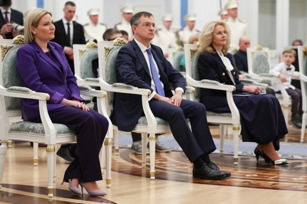 RUSSIA, MOSCOW - MARCH 25, 2025: Russia s Minister of Culture Olga Lyubimova, President Putin s adviser Vladimir Medinsky and Russia s Deputy Prime Minister Tatyana Golikova (L-R) attend a ceremony in the Kremlin in which Russia s President Putin (not pictured) presented Russian Presidential Prizes in Culture, Literature and Art for Year 2024 to young professionals for their works aimed at children and youth. Vyacheslav Prokofyev Russian Presidential Press and Information Office TASS  79357055