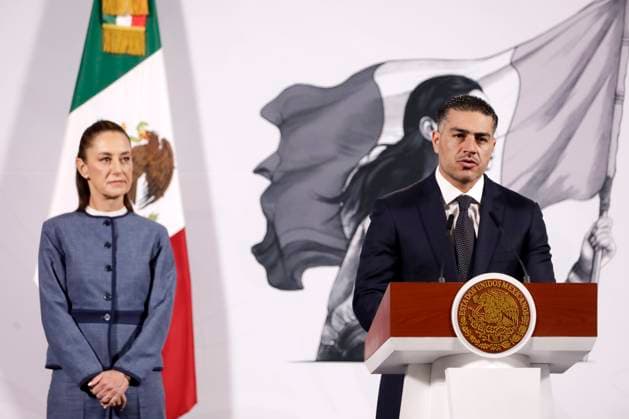 MexicoÃ¢â‚¬â ¢s President, Claudia Sheinbaum Parda is seen behind while the Secretary of Security and Citizen Protection, Omar Garcia Harfuch, speaks during the Security Cabinets bi weekly report at a press conference at the National Palace. on March 25, 2025 in Mexico City, Mexico. Mexico City Mexico - ZUMAe321 20250325_zia_e321_019 Copyright: xLuisxBarronx