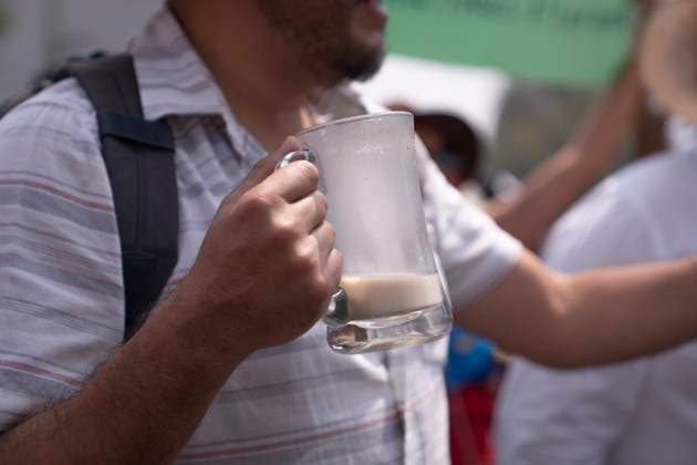 March 25, 2025, Mexico, Mexico: A demonstrator holds a pulque mug during a protest against the closure of the Paloma Azul pulqueria. Pulque workers held a protest to demand that the Administrative Verification Institute (INVEA) stop the closure of pulquerias in Mexico City, such as Paloma Azul. This year, up to 15 pulquer™as have been closed. Mexico Mexico - ZUMAs197 20250325_aaa_s197_106 Copyright: xGuillermoxDiazx