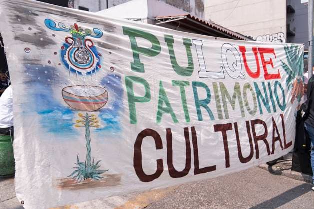 March 25, 2025, Mexico, Mexico: A banner that says Pulque Cultural Heritage is seen during a protest against the closure of the Paloma Azul pulqueria. Pulque workers held a protest to demand that the Administrative Verification Institute (INVEA) stop the closure of pulquerias in Mexico City, such as Paloma Azul. This year, up to 15 pulquer™as have been closed. Mexico Mexico - ZUMAs197 20250325_aaa_s197_114 Copyright: xGuillermoxDiazx