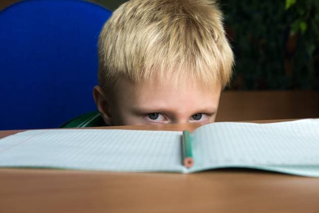 difficult school homework Tired boring boy don t want to do his difficult school homework ,model released, Symbolfoto Copyright: xZoonar.com oksanaxBratanovax 23050503 ,model released, Symbolfoto ,property released