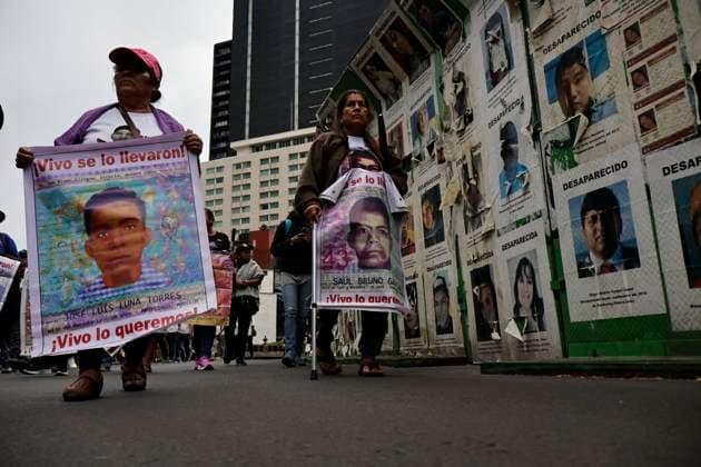 March 26, 2025, Mexico City, Cdmx, Mexico: Mothers, fathers, relatives, and classmates of the 43 students from Ayotzinapa, Guerrero, demonstrate on Paseo de la Reforma Avenue to demand that the government of Claudia Sheinbaum resolve the forced disappearance of the students, which occurred 10 years ago; the Mexican Army, the municipal police, and organized crime are being blamed for this incident. Mexico City Mexico - ZUMAp204 20250326_zip_p204_021 Copyright: xJosuexPerezx