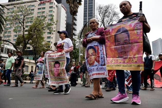 March 26, 2025, Mexico City, Cdmx, Mexico: Mothers, fathers, relatives, and classmates of the 43 students from Ayotzinapa, Guerrero, demonstrate on Paseo de la Reforma Avenue to demand that the government of Claudia Sheinbaum resolve the forced disappearance of the students, which occurred 10 years ago; the Mexican Army, the municipal police, and organized crime are being blamed for this incident. Mexico City Mexico - ZUMAp204 20250326_zip_p204_024 Copyright: xJosuexPerezx