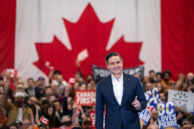 March 27, 2025, Surrey, Bc, CANADA: Conservative Leader Pierre Poilievre speaks during a campaign rally in Surrey B.C., on Thursday, March 27, 2025. Surrey CANADA  - ZUMAc35_ 20250327_zaf_c35_100 Copyright: xEthanxCairnsx