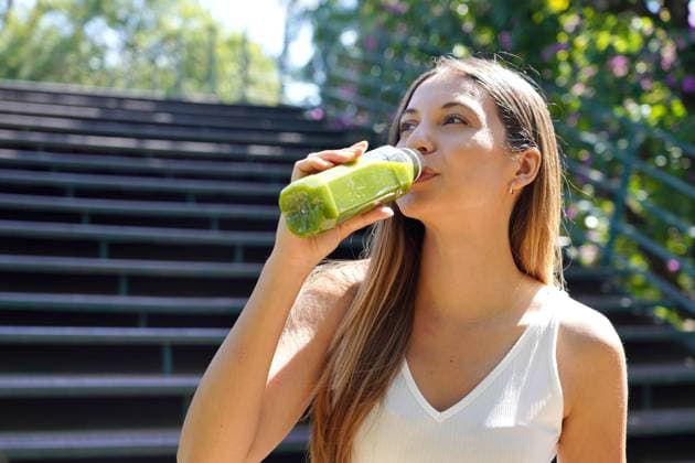 Beautiful healthy young woman drinking green smoothie detox juice outdoors, model released, , 57079020.jpg, Attractive, Happy, beautiful, bottle, brazil, brazilian, city, content, copy space, detox, diet, drinking, energy, female, fit, food, fresh, girl, green, happiness, health, healthy, hispanic, juice, kale, kiwi, latin, looking to the side, mexican, mint, morning, natural, nourishment, outdoors, park, people, portrait, runner, smiling, smoothie, summer, supplements, vegan, vegetables, vegetarian, vitamins, weight loss, wellness, woman, young RECORD DATE NOT STATED