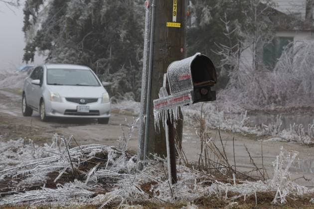March 30, 2025, Innisfil, Ont, CANADA: A frozen mailbox on a farm property in Innisfil, Ontario. after a multi-day complicated weather system hit the area with ice, freezing rain and snow - causing many tree branches and hydro wires to fall - leaving more than 250,000 hydro customers without power through the region. Hydro has advised customers in rural areas it may take longer than 48 hours to restore service. Innisfil CANADA - ZUMAs109 20250330_zaf_s109_024 Copyright: xChristopherxDrostx