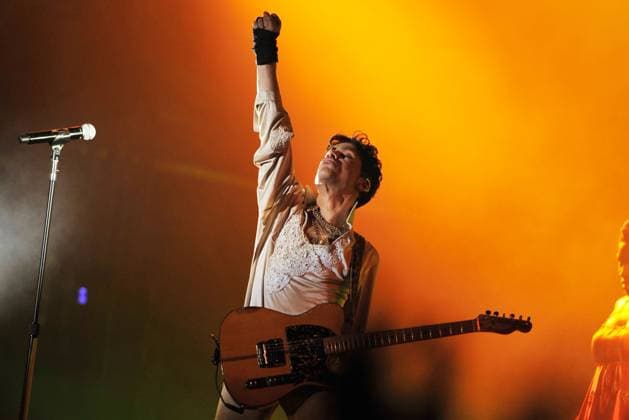 Prince (1958-2016) Prince (Prince Rogers Nelson), American music superstar and pioneer, dies aged 57 at his Paisley Park recording studio in Minnesota after he was briefly hospitalized last week for a flu emergency. STOCK IMAGE: Prince (Prince Rogers Nelson) The Artist Formerly Known as Prince , TAFKAP Hop Farm Festival, Paddock Wood, Kent, England 3rd July 2011 performing live on stage in concert gig singing playing guitar CAP MAR Martin Harris Great Britain Copyright: xMartinxHarris CapitalxPicturesx