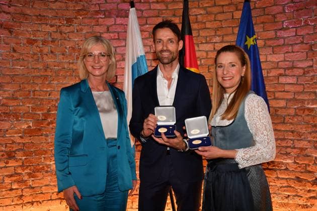 Ulrike Scharf Minister of State , Sven Hannawald and Stefanie Hertel Award of the Bavarian State Medal for Social Merit 2025 Allerheiligen Hofkirche, Munich Residence 03 April 2025