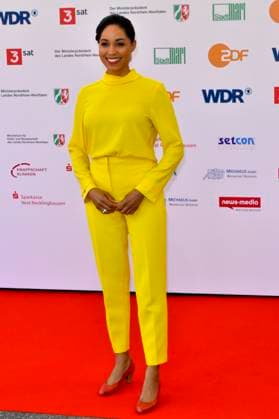 Jana Pareigis ZDF Heute presenter all in yellow as a guest at the 61 Grimme Award ceremony on 04 04 2025 in Marl NRW Germany