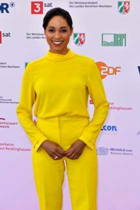 Jana Pareigis ZDF Heute presenter all in yellow as a guest at the 61 Grimme Award ceremony on 04 04 2025 in Marl NRW Germany