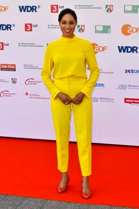 Jana Pareigis ZDF Heute presenter all in yellow as a guest at the 61 Grimme Award ceremony on 04 04 2025 in Marl NRW Germany