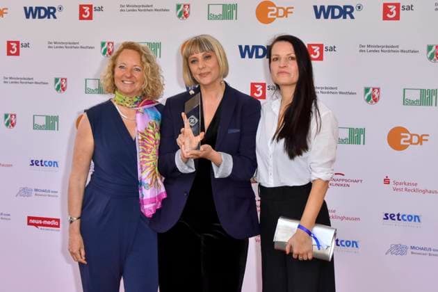 Steffi Niederzoll accompanied by Seven Winters in Tehran Award winner as a guest at the 61 Grimme Award ceremony on 04 04 2025 in Marl NRW Germany