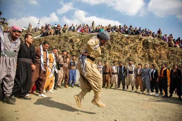 Nowruz in Kurdistan Iran A man performs a traditional Kurdish dance as people cheer around him in Sardasht, Iran on March 18, 2025. Nowruz, the Persian New Year, is celebrated by Kurds with traditional music, dancing, and gatherings that highlight Kurdish cultural identity. Sardasht West Azerbaijan Iran Copyright: xBarbodxKhorshidix