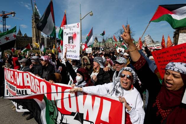 April 12, 2025, Ottawa, On, Canada: Pro-Palestinian protestors chant during a demonstration protesters are calling a National March for Palestine near Parliament Hill in Ottawa, on Saturday, April 12, 2025. Ottawa Canada  - ZUMAc35_ 20250412_zaf_c35_055 Copyright: xSpencerxColbyx