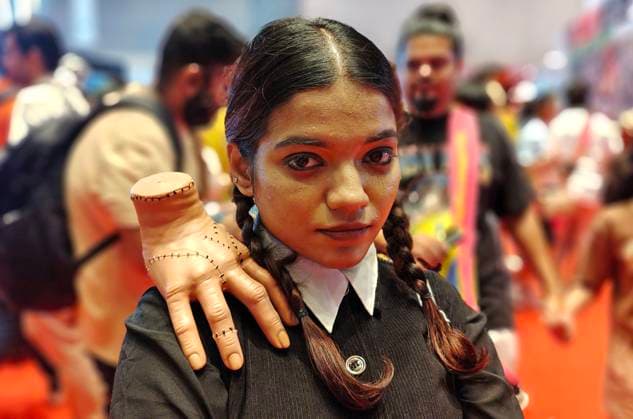 Entertainment Themen der Woche KW15 Entertainment Bilder des Tages Comic Con in Mumbai, India - 12 Apr 2025 Cosplayer dressed as Wednesday Addams from the franchise The Addams Family poses for a photo at Comic Con event. The event witnessed host of activities, merchandise and cosplayers showcasing trends in comic books, tv, films, manga, anime, gaming and animation among others. Mumbai India Copyright: xAshishxVaishnavx xSOPAxImagesx AVaishnav_Comic Con in Mumbai (21)