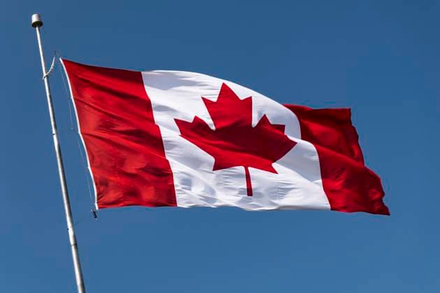 Canada maple leaf flag flying in the wind Ottawa, Ontario, Canada R_KSWG250412-1701088-01 EDITORIAL USE ONLY