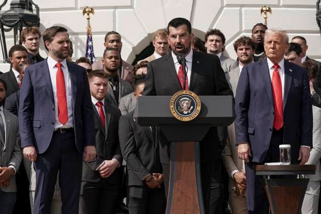 Ryan Day, coach for the 2025 College Football National Champions - The Ohio State University speaks as President Trump and Voce President JD Vance look on, on the South Lawn of the White House in Washington, DC on Monday, April 14, 2025.  WAS20250414568 KenxCedeno