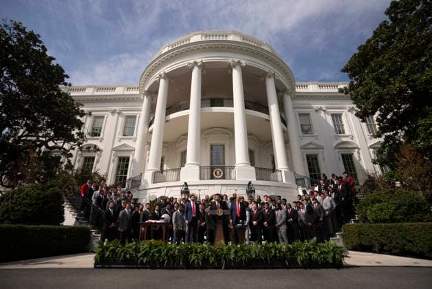 Ryan Day, coach for the 2025 College Football National Champions - The Ohio State University speaks as President Trump and Voce President JD Vance look on, on the South Lawn of the White House in Washington, DC on Monday, April 14, 2025.  WAS20250414569 KenxCedeno