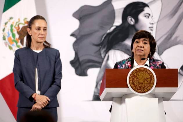 MexicoÃ¢â‚¬â ¢s President, Claudia Sheinbaum Pardo is seen behind while Secretary of Agrarian, Territorial and Urban Development, Edna Vega Rangel, speaks during a briefing conference at National Palace. on April 14, 2025 in Mexico City, Mexico. Mexico City Mexico - ZUMAe321 20250414_zia_e321_028 Copyright: xLuisxBarronx