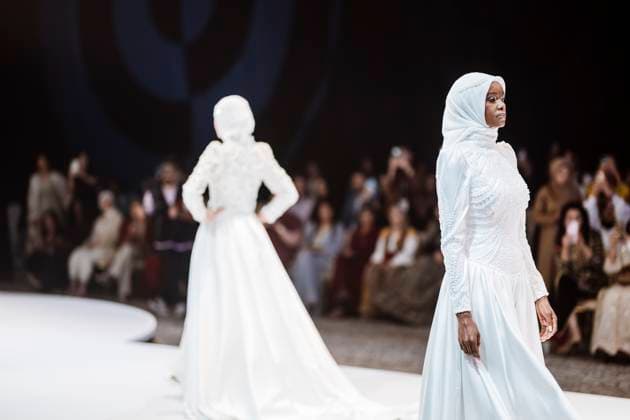 April 14, 2025, Abu Dhabi, United Arab Emirates: Models seen on stage for Salam Design. Designers Miha (Turkey), Salam Design (Palestine), Turana Atash (London - UK), Arta Kallaba (USA) and Khalifa Fund x Emirati Designers (UAE) attend the first runaway of Abu Dhabi Modest Fashion Week organized by Think Fashion at St. Regis Saadiyat Island Resort. Abu Dhabi United Arab Emirates - ZUMAs197 20250414_aab_s197_020 Copyright: xValeriaxFerrarox