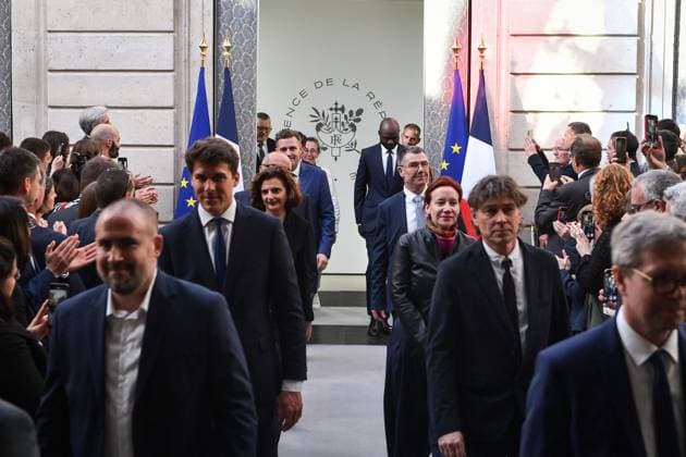 Emmanuel Macron awards those involved in Notre Dame de Paris Cathedral restorations - FA Citizens involved in the restorations of Notre-Dame de Paris Cathedral arrive for their awarding ceremony at the Elysee Palace in Paris on April 15, 2025. Photo by Firas Abdullah ABACAPRESS.COM Paris Ile-de-France France  Copyright: xAbdullahxFiras ABACAx
