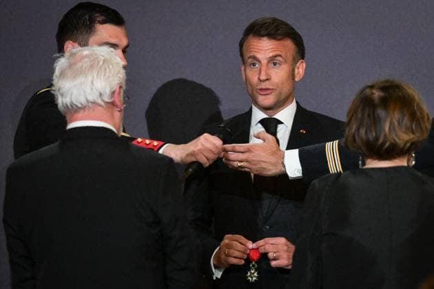 Emmanuel Macron awards those involved in Notre Dame de Paris Cathedral restorations - FA French President Emmanuel Macron awards those involved in the restorations of Notre-Dame de Paris Cathedral at the Elysee Palace in Paris on April 15, 2025. Photo by Firas Abdullah ABACAPRESS.COM Paris Ile-de-France France  Copyright: xAbdullahxFiras ABACAx