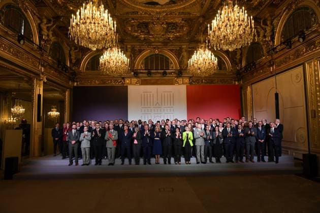 Emmanuel Macron awards those involved in Notre Dame de Paris Cathedral restorations - FA French President Emmanuel Macron poses for a photo with his wife Brigitte Macron, French Prime Minister Francois Bayrou, French Culture Minister Rachida Dati after awarding those involved in the restorations of Notre-Dame de Paris Cathedral at the Elysee Palace in Paris on April 15, 2025. Photo by Firas Abdullah ABACAPRESS.COM Paris Ile-de-France France  Copyright: xAbdullahxFiras ABACAx