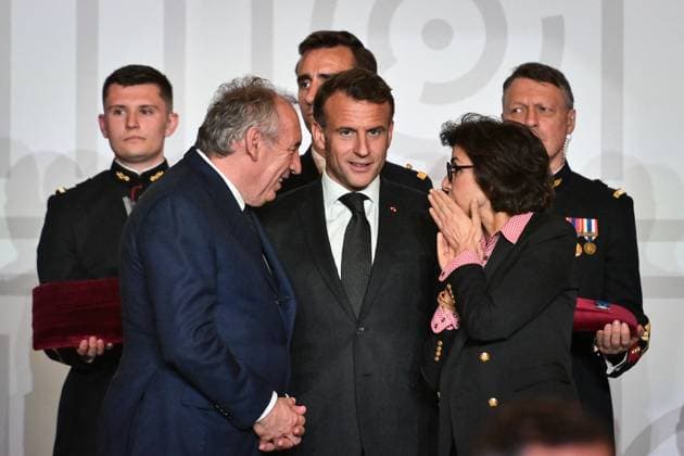 Emmanuel Macron awards those involved in Notre Dame de Paris Cathedral restorations - FA French President Emmanuel Macron speaks with French Prime Minister Francois Bayrou and French Culture Minister Rachida Dati during awarding those involved in the restorations of Notre-Dame de Paris Cathedral at the Elysee Palace in Paris on April 15, 2025. Photo by Firas Abdullah ABACAPRESS.COM Paris Ile-de-France France  Copyright: xAbdullahxFiras ABACAx