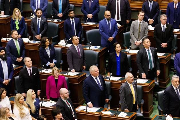 April 15, 2025, Toronto, On, CANADA: Ontario Premier Doug Ford and his MPP s stand for the Canadian anthem, after Ontario Lt.-Gov. Edith Dumont, delivered her speech from the throne at Queen s Park in Toronto on Tuesday, April 15, 2025. Toronto CANADA  - ZUMAc35_ 20250415_zaf_c35_054 Copyright: xColexBurstonx