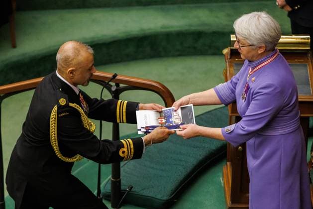 April 15, 2025, Toronto, On, CANADA: Ontario Lt.-Gov. Edith Dumont, receives the paper copy of her speech from the throne at Queen s Park in Toronto on Tuesday, April 15, 2025. Toronto CANADA  - ZUMAc35_ 20250415_zaf_c35_056 Copyright: xColexBurstonx