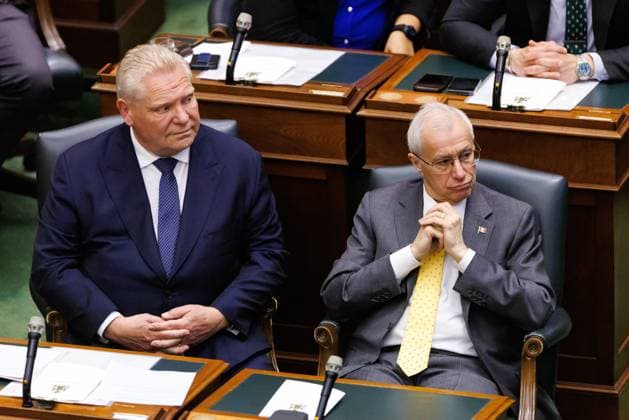 April 15, 2025, Toronto, On, CANADA: Ontario Premier Doug Ford, and MPP Vic Fedeli listen as Ontario Lt.-Gov. Edith Dumont, delivers her speech from the throne at Queen s Park in Toronto on Tuesday, April 15, 2025. Toronto CANADA  - ZUMAc35_ 20250415_zaf_c35_058 Copyright: xColexBurstonx