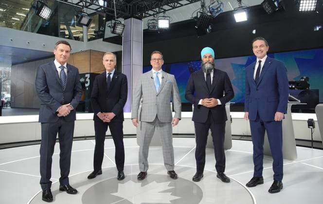 April 16, 2025, Montreal, Pq, Canada: Moderator, Radio-CanadaöÄÃ s Patrice Roy stands with Liberal leader Mark Carney, Bloc Quebecois Leader Yves-Francois Blanchet, New Democratic Party Leader Jagmeet Singh and Conservative Leader Pierre Poilievre pose for a photo before the French-language federal leaders debate, in Montreal, Wednesday, April 16, 2025. Montreal Canada - ZUMAc35_ 20250416_zaf_c35_117 Copyright: xChristopherxKatsarovx