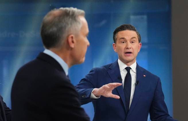 April 16, 2025, Montreal, Pq, Canada: Liberal Leader Mark Carney looks on as Conservative Leader Pierre Poilievre makes a point during the French-language federal leaders debate, in Montreal, Wednesday, April 16, 2025. Montreal Canada  - ZUMAc35_ 20250416_zaf_c35_206 Copyright: xSeanxKilpatrickx