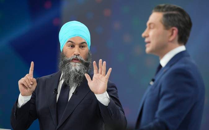 April 16, 2025, Montreal, Pq, Canada: New Democratic Party Leader Jagmeet Singh makes a point to Conservative Leader Pierre Poilievre during the French-language federal leaders debate, in Montreal, Wednesday, April 16, 2025. Montreal Canada  - ZUMAc35_ 20250416_zaf_c35_216 Copyright: xChristopherxKatsarovx