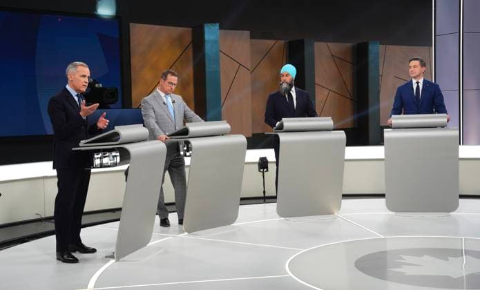 April 16, 2025, Montreal, Pq, Canada: Conservative Leader Pierre Poilievre, New Democratic Party Leader Jagmeet Singh and Bloc Quebecois Leader Yves-Francois Blanchet listen as Liberal Leader Mark Carney speaks during the French-language federal leaders debate, in Montreal, Wednesday, April 16, 2025. Montreal Canada  - ZUMAc35_ 20250416_zaf_c35_226 Copyright: xSeanxKilpatrickx