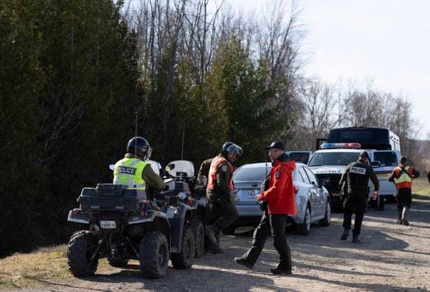 April 17, 2025, Godmanchester, Pq, CANADA: Surete du Quebec and RCMP officers arrive back at a command post after searching for a woman and her two children who are missing crossing the border into Canada illegally overnight in Godmanchester, Que., on Thursday, April 17, 2025. Godmanchester CANADA  - ZUMAc35_ 20250417_zaf_c35_063 Copyright: xChristinnexMuschix